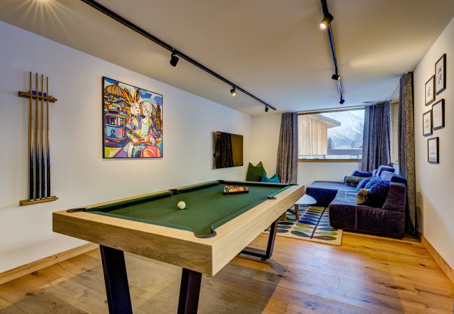 Additional social space in TV room with pool table  Chalet les Trois Soeurs has additional social space in a TV room with a pool table