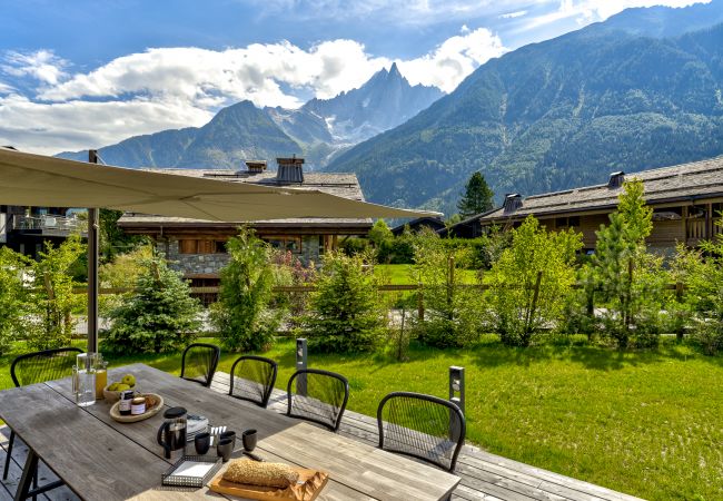 Outdoor dining furniture and large parasol   Chalet les Trois Soeurs has outdoor dining furniture and a large parasol