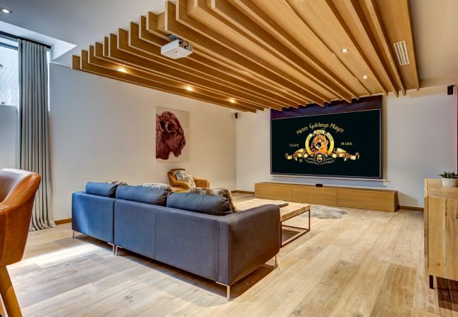 Cinema screen with Bose sound system  Chalet Black Pearl has a cinema screen with a Bose sound system