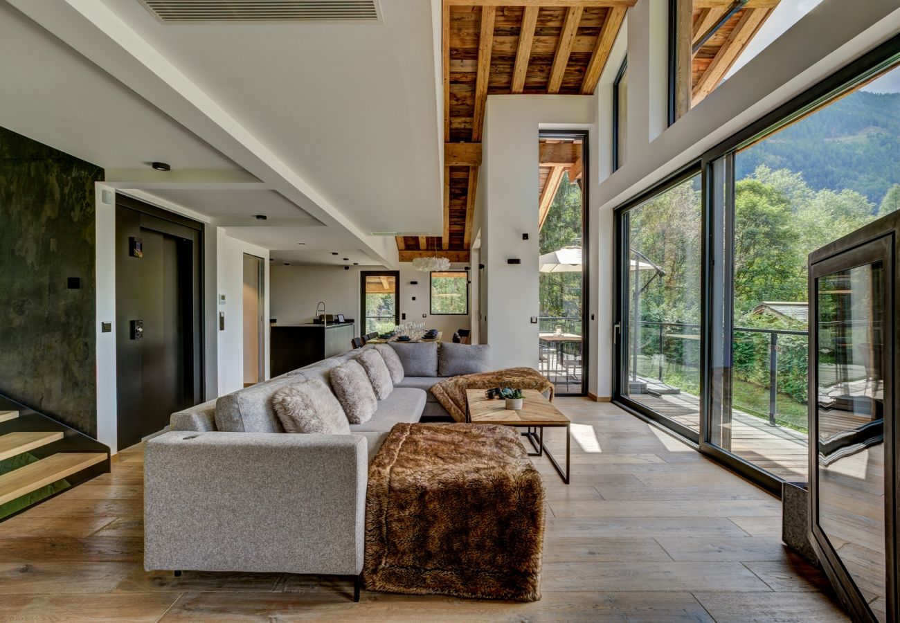 Large glass doors opening onto balcony Chalet Black Pearl has large glass doors opening onto the balcony