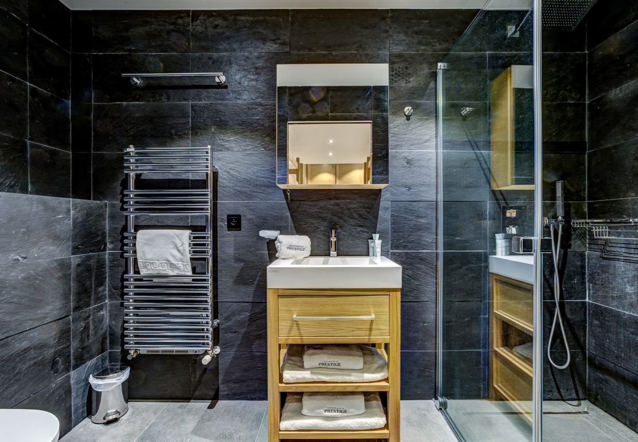 Ensuite shower room to Bedroom 5 with WC Bedroom 5 of Chalet Black Pearl has an ensuite shower room with WC