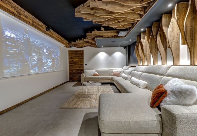 Cinema room for in-house entertainment Chalet les Côtés du Lavancher  has a cinema room for in-house entertainment.