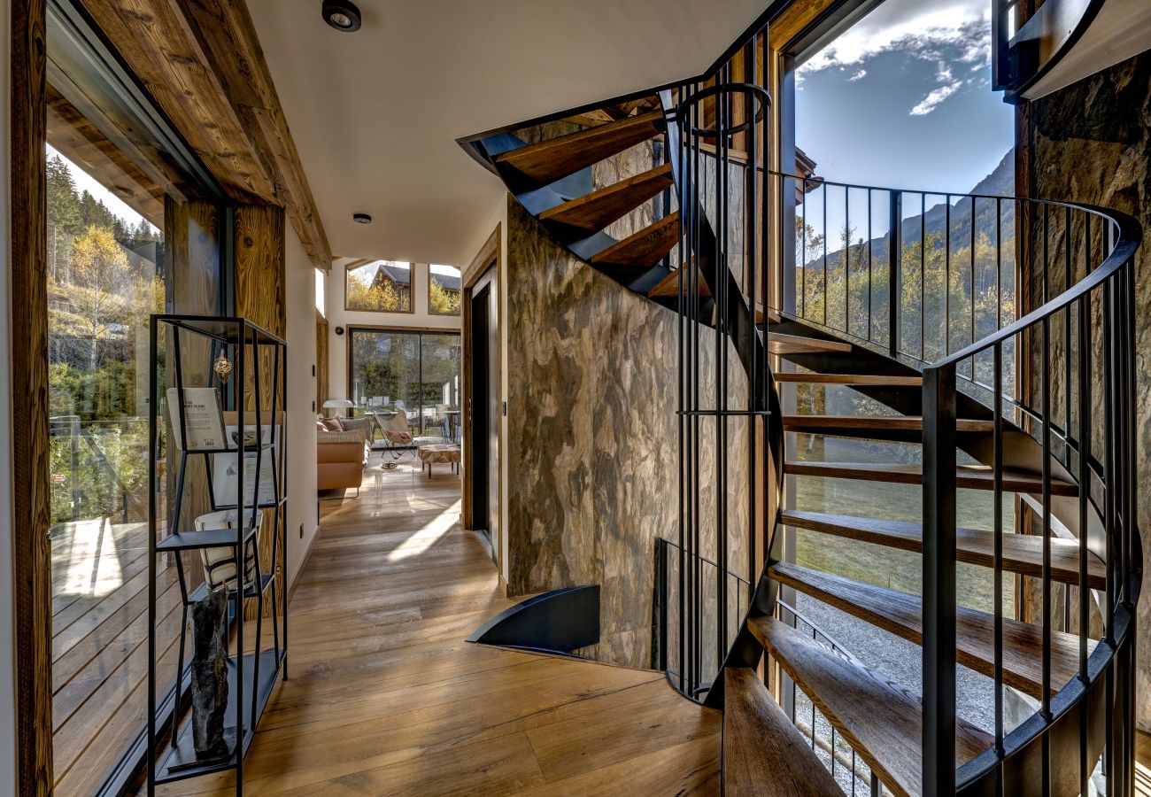 Aspect towards lounge area from kitchen, dining area Chalet les Côtés du Lavancher is a beautiful new chalet.