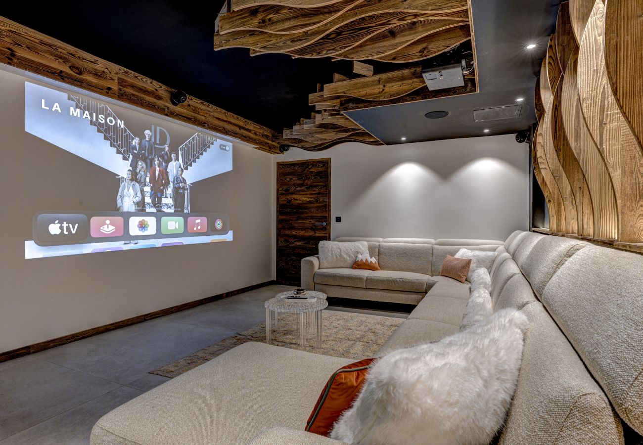 Cinema room with sound system   Chalet les Côtés du Lavancher has a cinema room with sound system.